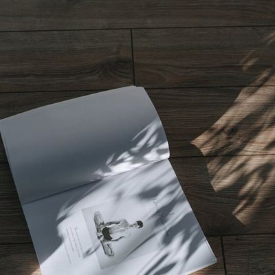 A serene space for yoga with a rolled mat and soft natural light.